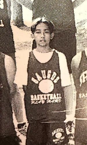 Bobby in a basketball jersey, in an old black-and-white team photo
